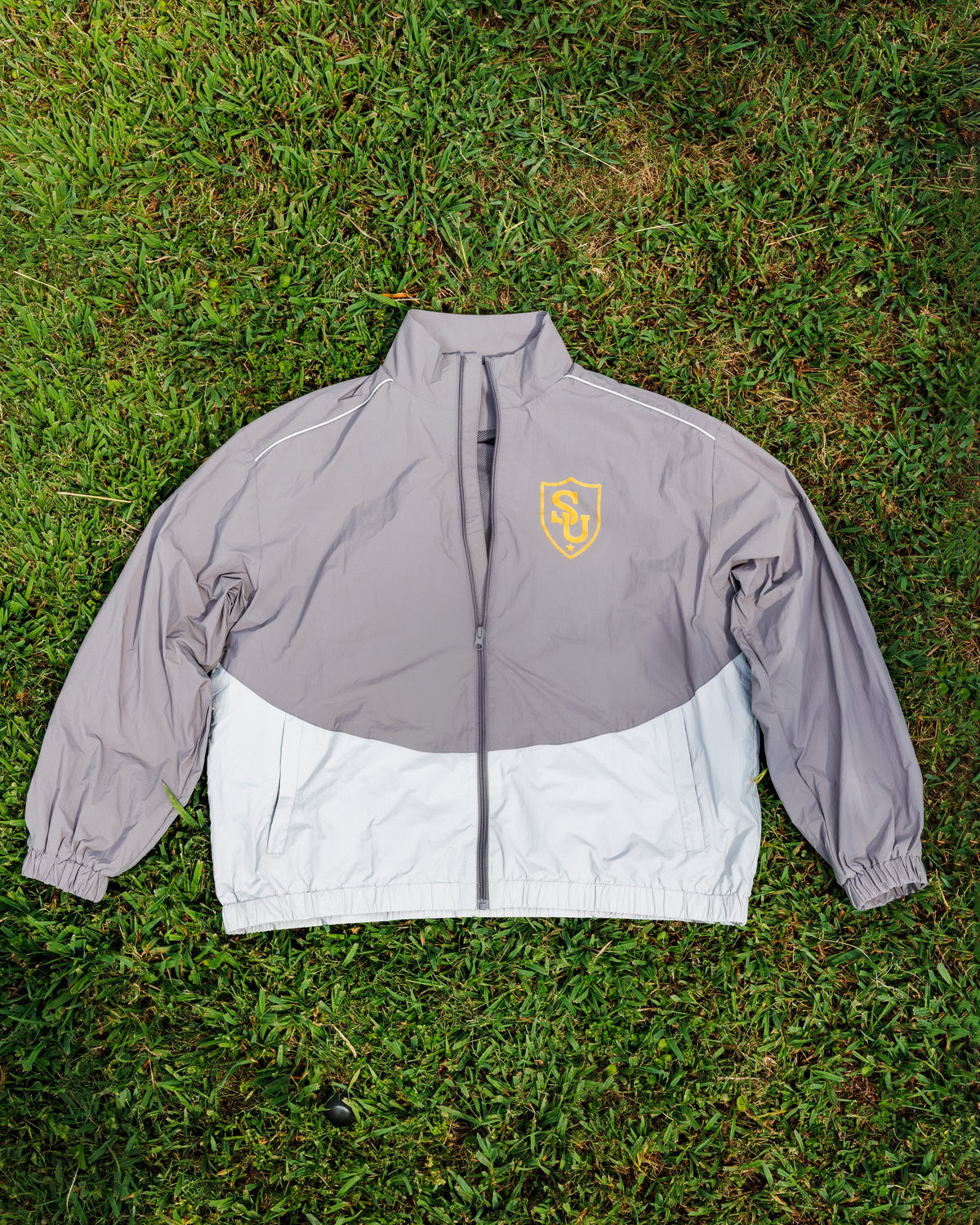 Sweeties University coaches track jacket, front